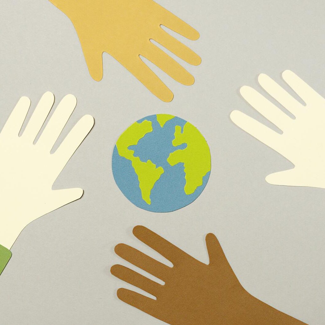 hand cutouts and an earth cutout